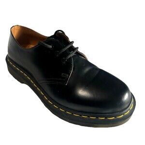 Dr. Martens Black Leather Flats with Yellow Stitching